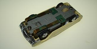 Atlas HO Slot Car Yellow Ford Thunderbird Chassis