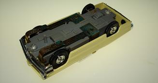 Atlas HO Slot Car Yellow Pontiac Grand Prix Posts