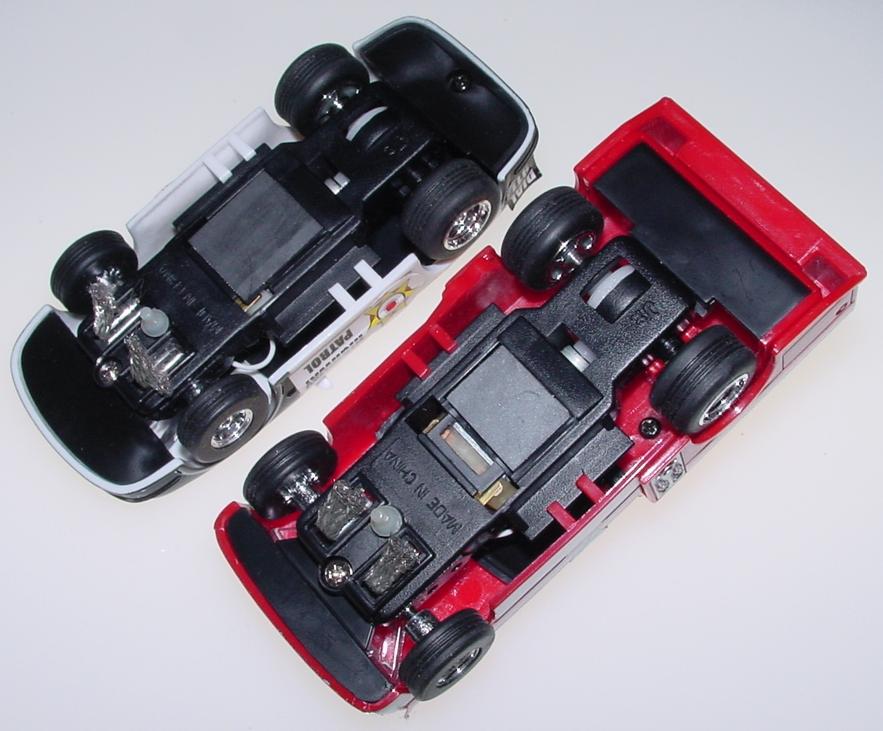 1:43 Scale Black & White Police Car & Red Fire Engine Slot Cars Trunks 1:43 Scale Black & White Police Car & Red Fire Engine Slot Cars Trunks
