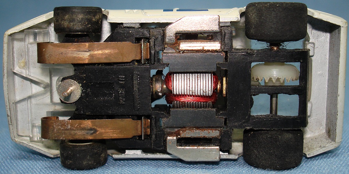 Amrac Chevrolet Corvette White Red Blue #12 HO Slot Car Chassis Operating Headlights Amrac Chevrolet Corvette White Red Blue #12 HO Slot Car Chassis Operating Headlights