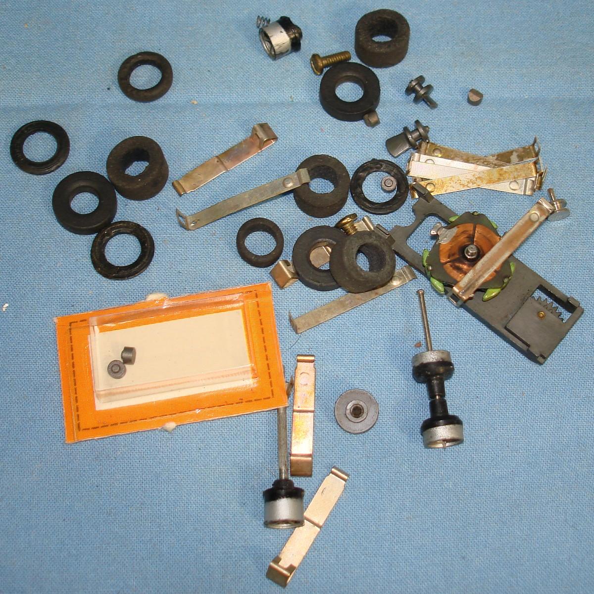 Aurora Model Motoring AFX HO Slot Car Racing Chassis Parts Tires Pickup Shoes Rims Guides Gears #2467 Aurora Model Motoring AFX HO Slot Car Racing Chassis Parts Tires Pickup Shoes Rims Guides Gears #2467