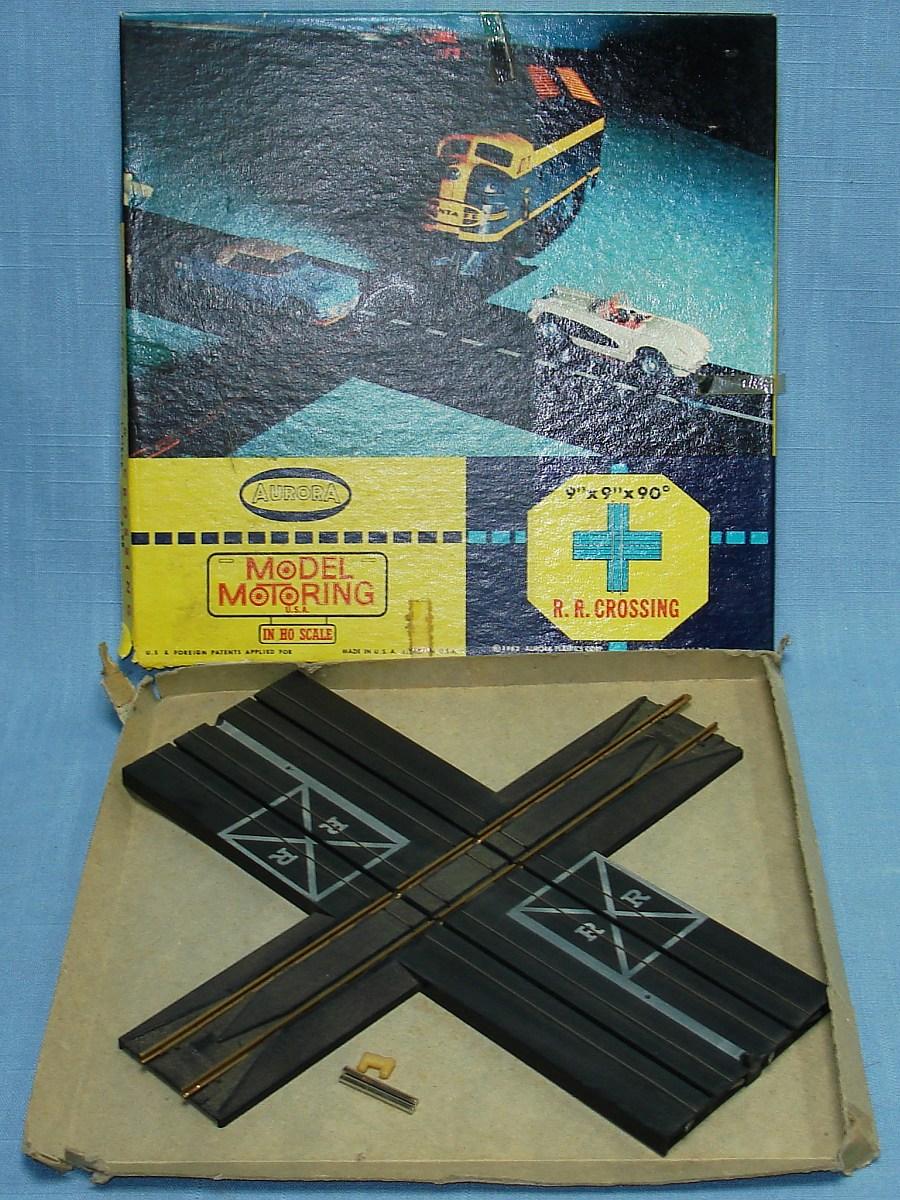 Aurora Model Motoring Slot Car Racing Lock Joiner Two Lane Railroad Crossing Track Boxed #1522 Aurora Model Motoring Slot Car Racing Lock Joiner Two Lane Railroad Crossing Track Boxed #1522