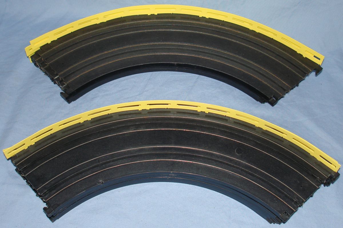 Aurora AFX Slot Car Track 9 Inch Curved Track Sections & Yellow Guard Rails Aurora AFX Slot Car Track 9 Inch Curved Track Sections & Yellow Guard Rails