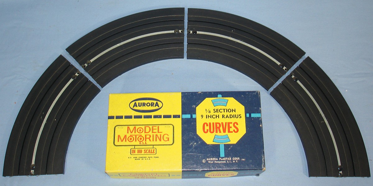 Aurora Model Motoring HO Scale Slot Car Racing Nine Inch Two Lane Radius Curved Roadways #1514 Aurora Model Motoring HO Scale Slot Car Racing Nine Inch Two Lane Radius Curved Roadways #1514